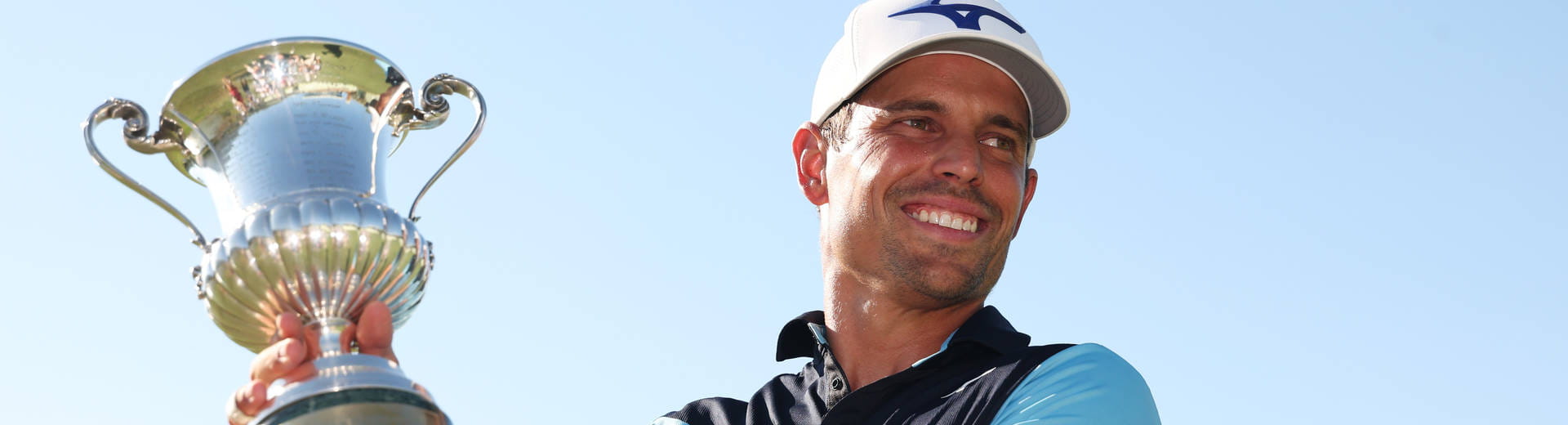 Adrien Saddier celebrates with the Italian Open trophy at Argentario Golf and Wellness Resort in 2025.